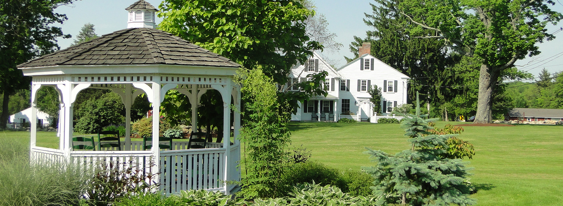 Warren Conf Center pergola and historic home crop2