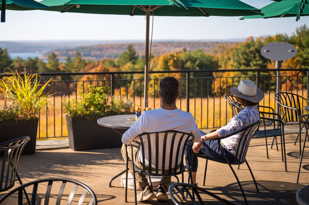 A couple enjoying the outdoor cafe at Tower Hill.